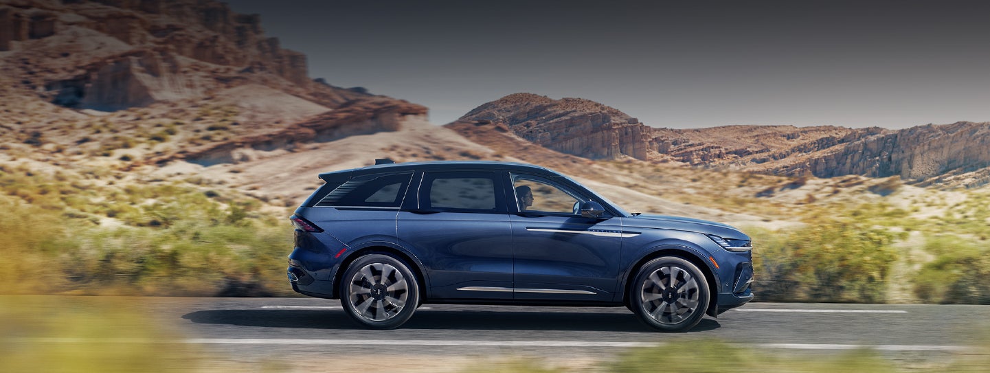 A 2024 Lincoln Nautilus® SUV is being driven in a desert setting. | Al Packer Lincoln in West Palm Beach FL