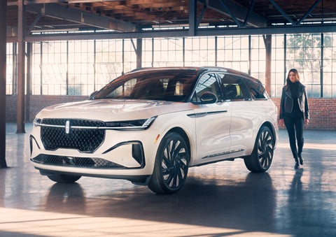 A person approaches a 2024 Lincoln Nautilus® SUV. | Al Packer Lincoln in West Palm Beach FL