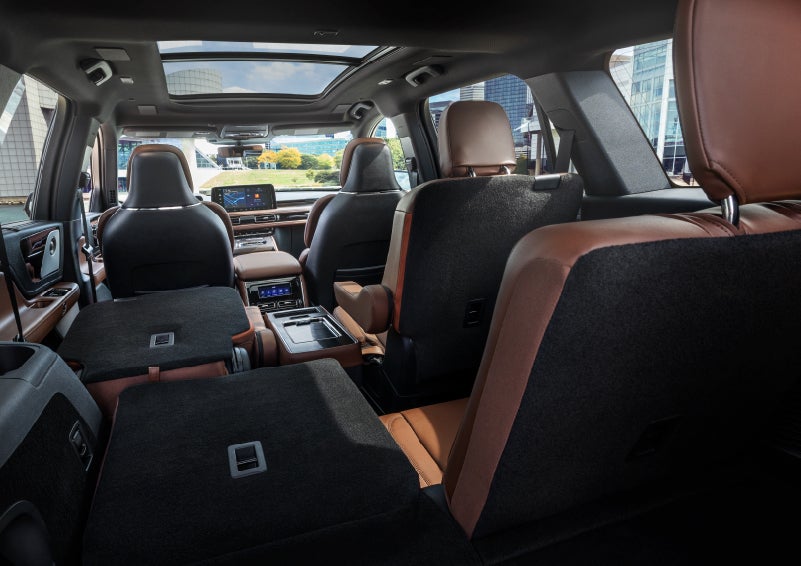 The interior of the 2025 Lincoln Aviator® SUV is shown with two seats folded down for added space. | Al Packer Lincoln in West Palm Beach FL