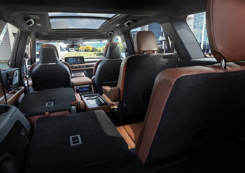 The interior of the 2025 Lincoln Aviator® SUV is shown with two seats folded down for added space. | Al Packer Lincoln in West Palm Beach FL