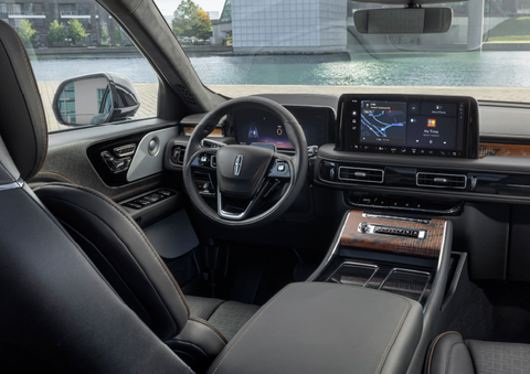 The interior of the 2025 Lincoln Aviator® SUV is shown parked with a view of a harbor through the windshield. | Al Packer Lincoln in West Palm Beach FL