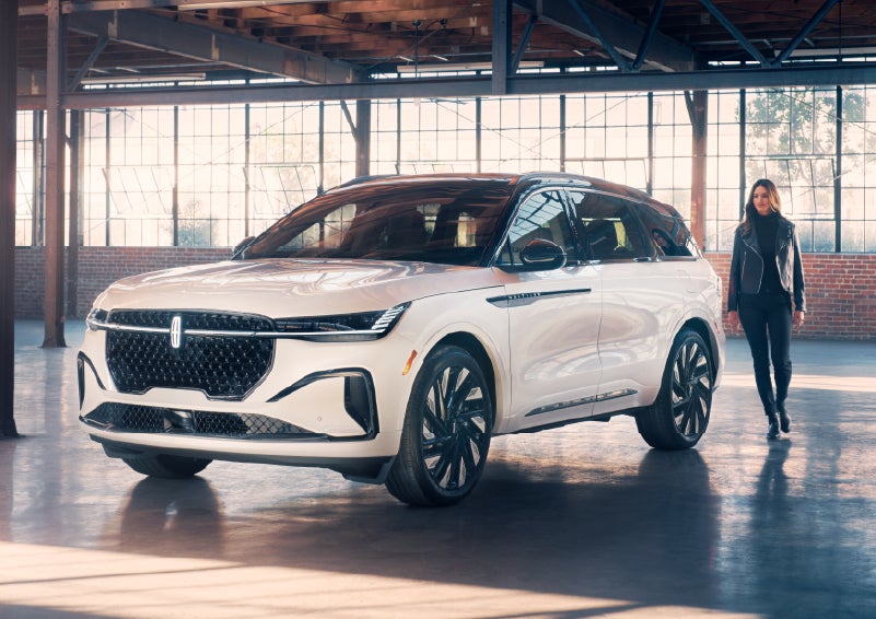 A person approaches a 2025 Lincoln Nautilus® SUV. | Al Packer Lincoln in West Palm Beach FL