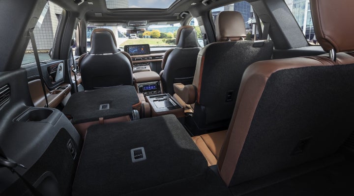 One side of the PowerFold® third-row seat and a second-row seat are folded forward in the 2026 Lincoln Aviator® SUV. | Al Packer Lincoln in West Palm Beach FL