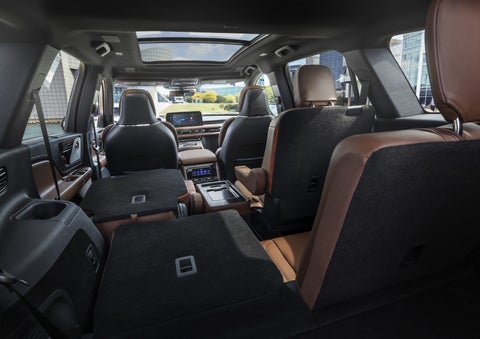 One side of the PowerFold® third-row seat and a second-row seat are folded forward in the 2026 Lincoln Aviator® SUV. | Al Packer Lincoln in West Palm Beach FL