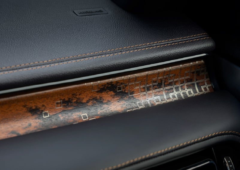 A close-up shot of the 2026 Lincoln Aviator® dashboard with unique black and brown accents and brown stitching. | Al Packer Lincoln in West Palm Beach FL