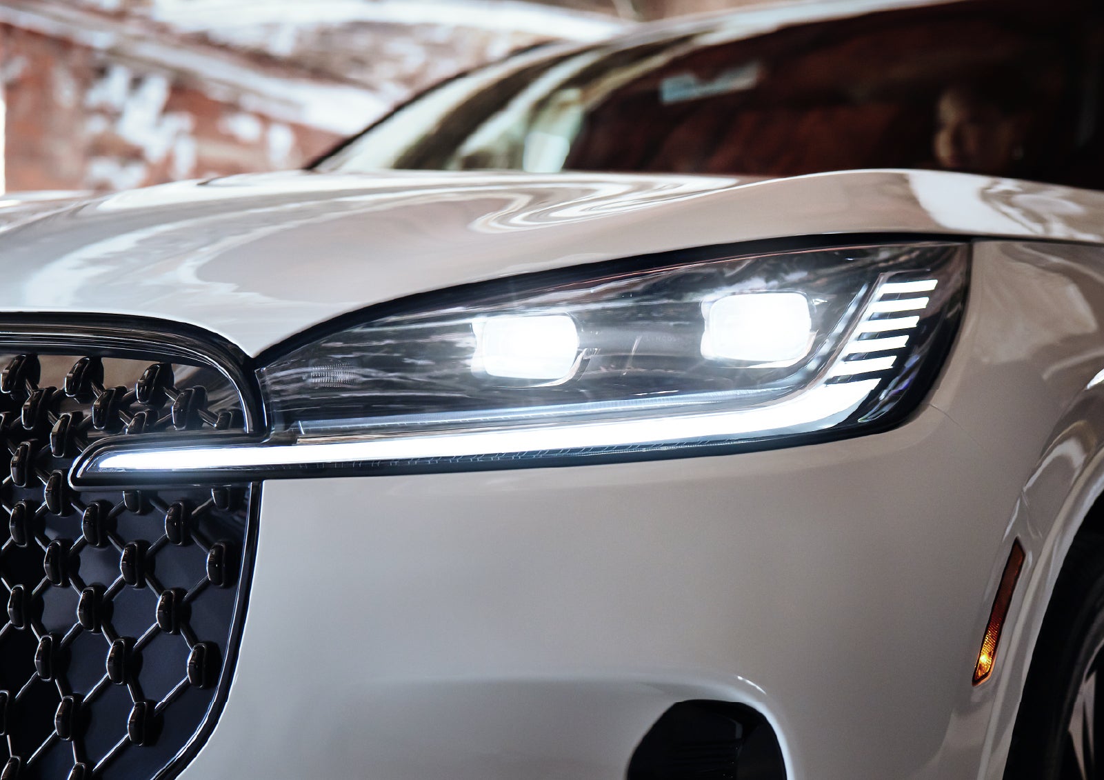 A close-up of a headlamp on the 2027 Lincoln Aviator® SUV is shown. | Al Packer Lincoln in West Palm Beach FL