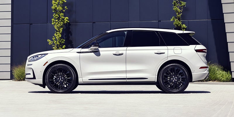 A side view of a white 2024 Lincoln Corsair