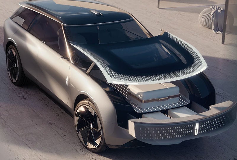 A front view of the star concept with the hood open to show extra storage